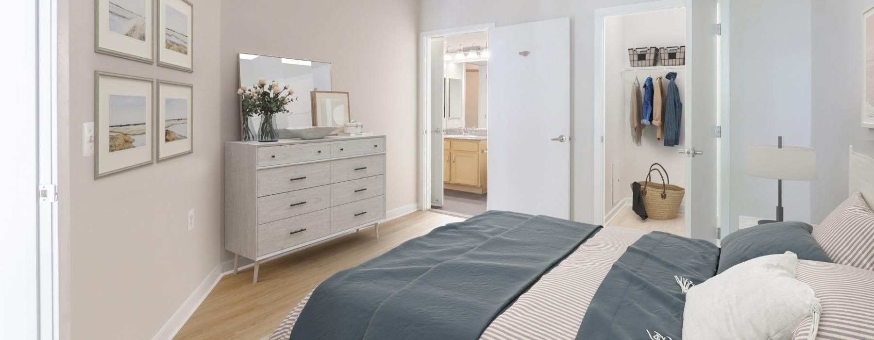 a bedroom with a bed and dresser