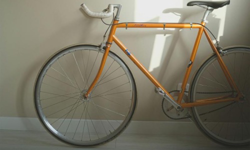 a bicycle parked in a room