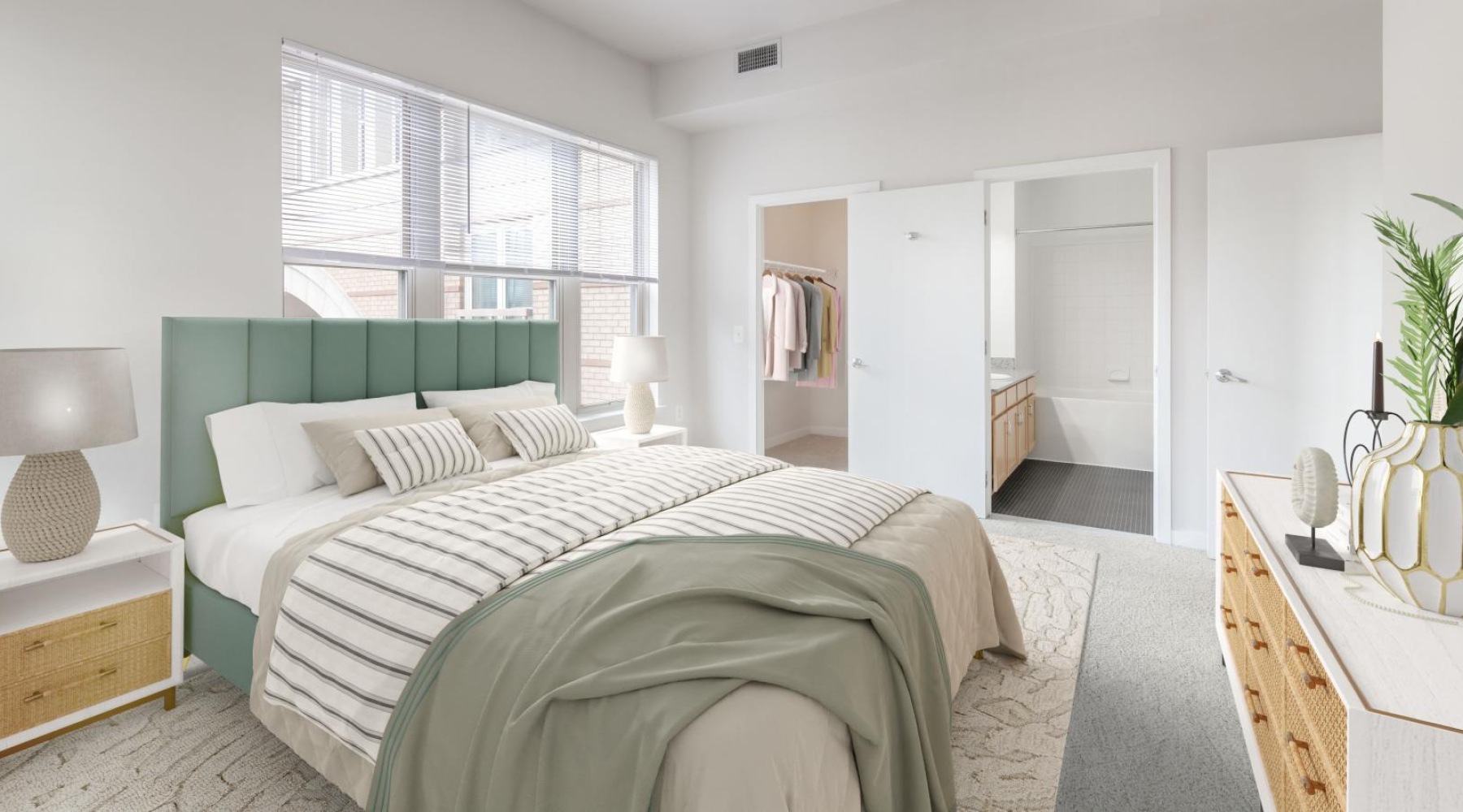 a bedroom with a bed and a closet and a large window